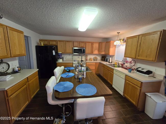9276 Elm Ct, House other with 6 bedrooms, 5 bathrooms and null parking in SPRING HILL FL | Image 4