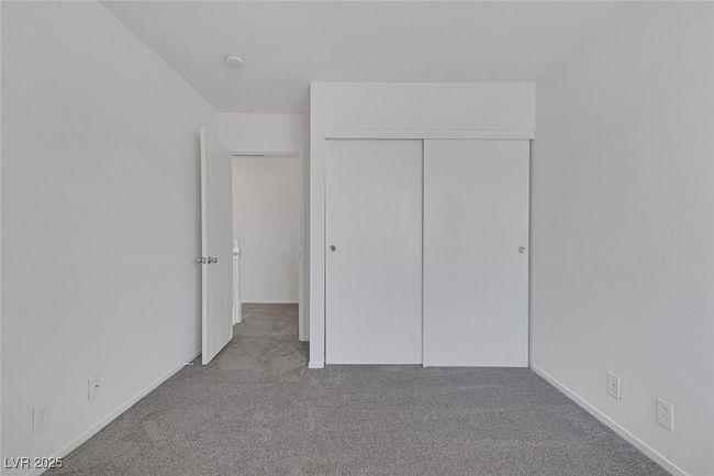Unfurnished bedroom featuring carpet and a closet | Image 23