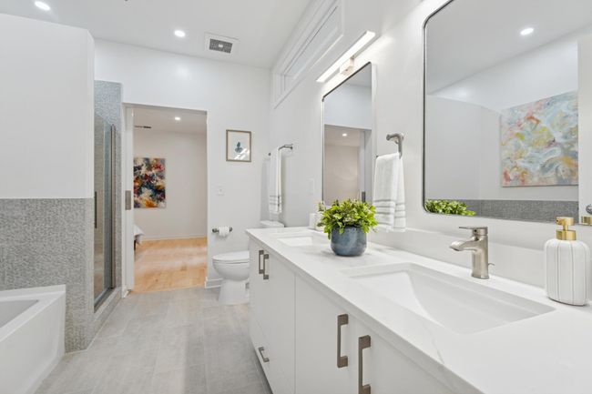 A dual-sink vanity offers daily luxury with ample space and refined finishes—ideal for peaceful morning routines. | Image 22