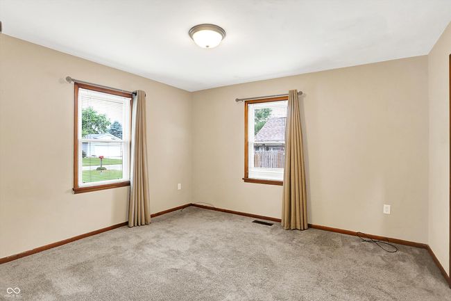 empty room featuring light colored carpet and baseboards | Image 14