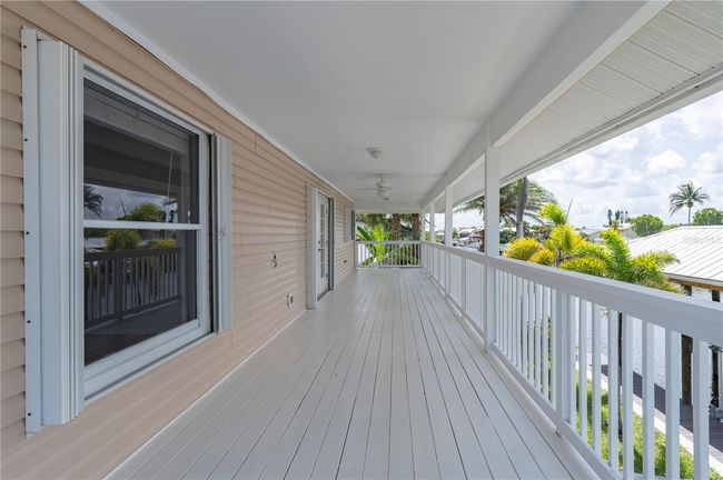 24261 Captain Kidd Blvd, House other with 3 bedrooms, 3 bathrooms and null parking in PUNTA GORDA FL | Image 36
