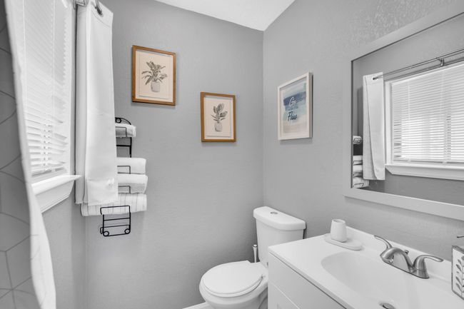 Bathroom with toilet and vanity | Image 19