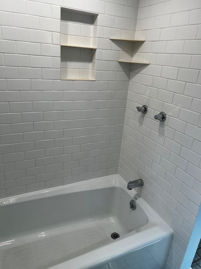 Bathroom featuring shower / bath combination | Image 8