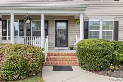 Doorway to property featuring covered porch | Image 2