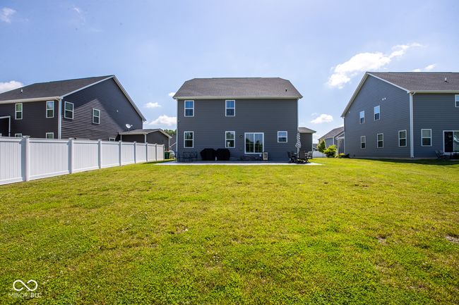 Large backyard with plenty of space to relax or play | Image 34