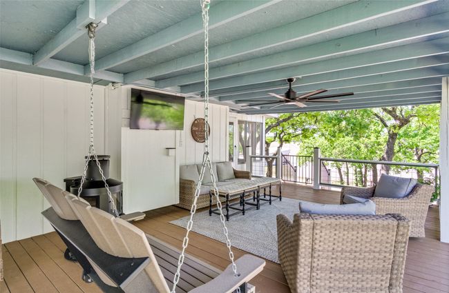 Cozy up on the large deck overlooking lake | Image 5
