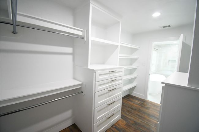 Secondary bedroom closet with quality built-ins | Image 26