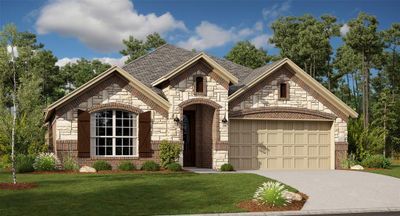 View of front facade featuring a front yard and a garage | Image 1