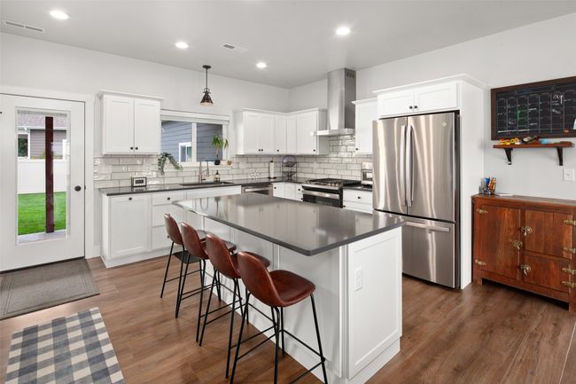 Eat in kitchen & access to back patio. | Image 29