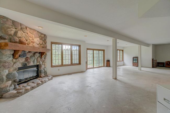 Downstairs, the bright walkout lower level offers the potential to create more finished space—unlocking both instant equity and room to grow! | Image 37