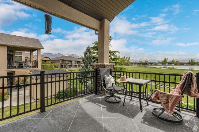Balcony with a residential view, golf course view, and a water and mountain view | Image 27