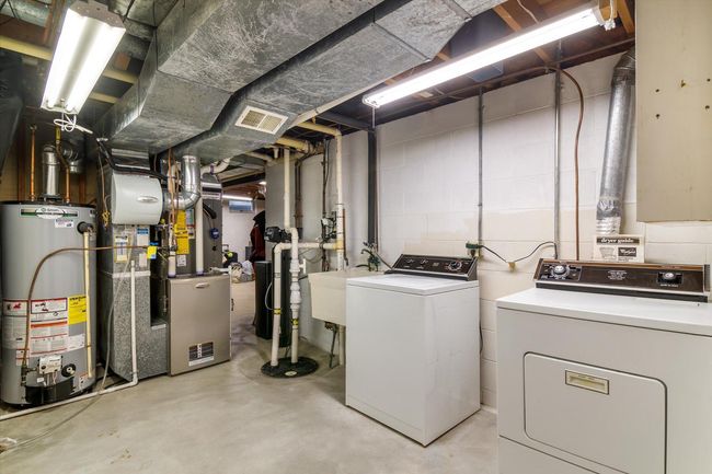 Utility room with access to the large storage room (not pictured) | Image 29