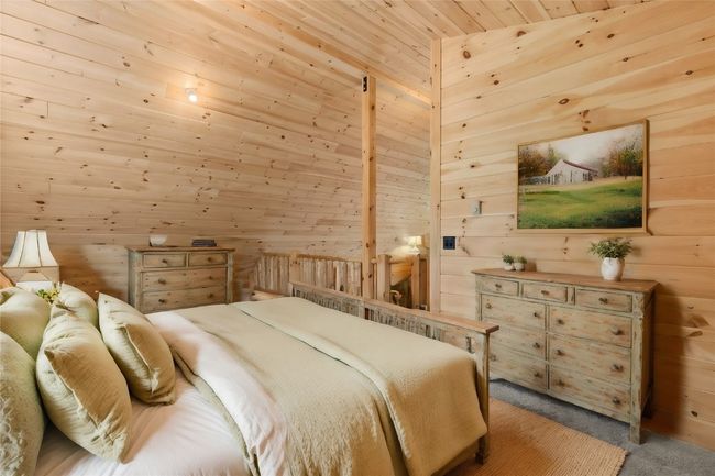 Virtual staged Bedroom upstairs with a different furniture layout | Image 29