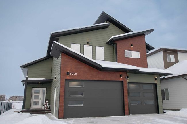 6522 Grande Banks Drive, Home with 5 bedrooms, 3 bathrooms and 6 parking in Grande Prairie AB | Image 1