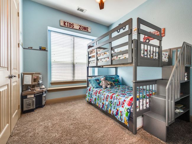 Bedroom featuring carpet and baseboards | Image 19