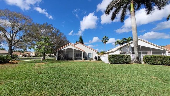 1599 Oak Berry Cir, House other with 3 bedrooms, 2 bathrooms and null parking in Wellington FL | Image 45