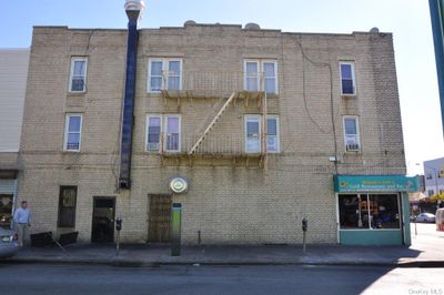 View of building exterior featuring cooling unit | Image 2