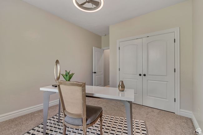 Office area with light colored carpet and baseboards | Image 12