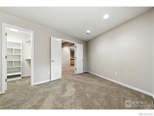 Bedroom 3 has a large walk-in closet. | Image 26