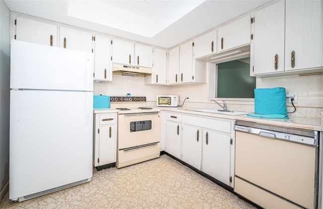 APT-107 - 1450 Heather Ridge Blvd, Condo with 2 bedrooms, 1 bathrooms and null parking in DUNEDIN FL | Image 16