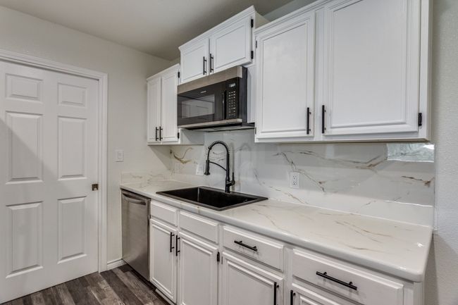 Pantry is just beyond behind the door | Image 7