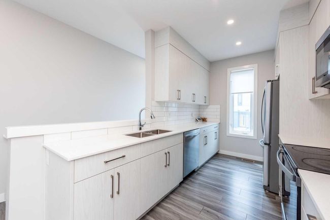 213 Evanscrest Sq Nw, Townhouse with 2 bedrooms, 3 bathrooms and 2 parking in Calgary AB | Image 12