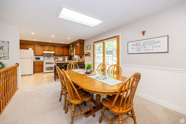Dining space with baseboards, wainscoting, and recessed lighting | Image 22