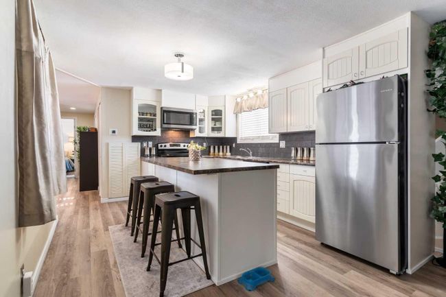 35 - 3223 83 Street Nw, Home with 2 bedrooms, 1 bathrooms and 1 parking in Calgary AB | Image 6