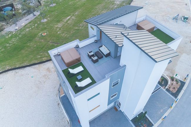 ROOFTOP PIC OF BUILDING 3 FROM PHASE 1. EACH CONDO HAS IT'S OWN ROOFTOP PATIO. | Image 5