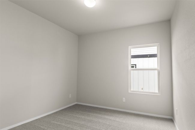 Carpeted empty room with baseboards | Image 23