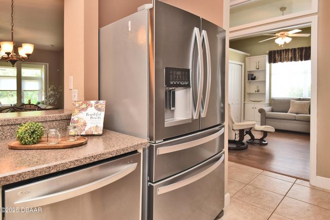 Washer, fridge to hall, bed 2 | Image 15