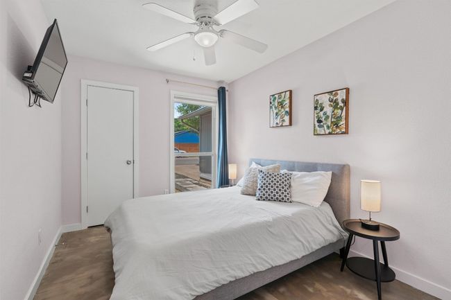 Bedroom with baseboards and ceiling fan | Image 19