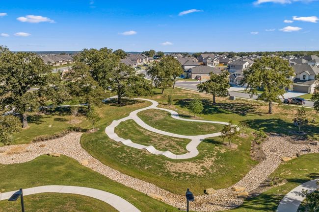 Fun, paved bike/skate course located across from the upcoming Lake House Amenity Center. | Image 12