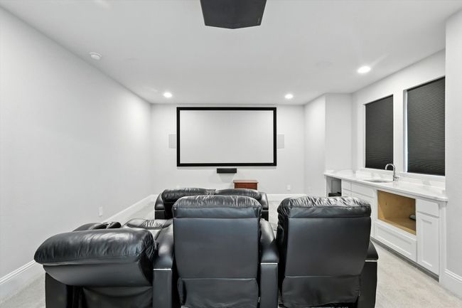 Cinema with recessed lighting and light colored carpet | Image 30
