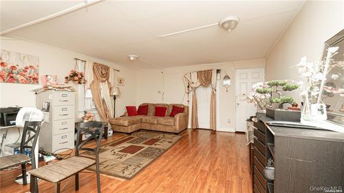 90 207th St, Queens Village, NY, 11428-1068 | Card Image