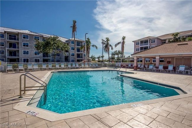 Pool featuring a patio and fence | Image 26
