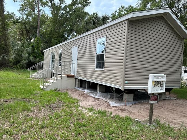 55917 Cabbage Rd, House other with 2 bedrooms, 2 bathrooms and null parking in ASTOR FL | Image 4