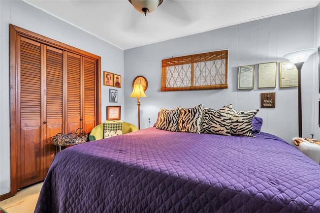 Bedroom featuring a closet and a ceiling fan | Image 42