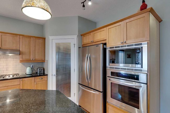 144 Westland Street, Home with 4 bedrooms, 3 bathrooms and 4 parking in Okotoks AB | Image 10