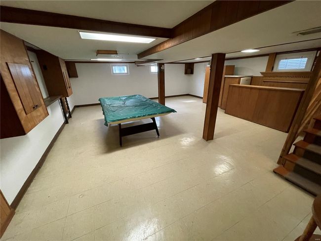 Below grade area with light floors and baseboards | Image 34