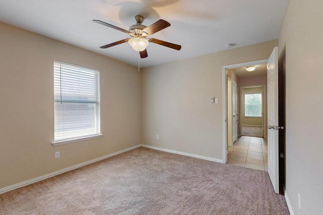 One of the secondary bedrooms has a walk in closet. | Image 30