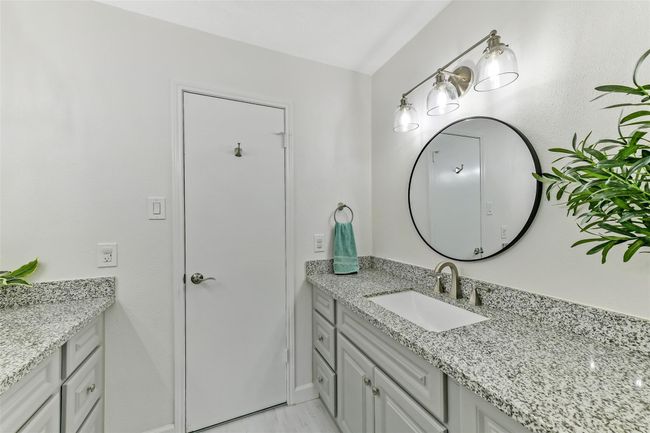 The space includes ample cabinetry complemented by neutral tones for a fresh look. | Image 30
