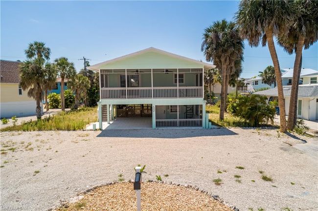 126 Andre Mar Dr, House other with 3 bedrooms, 2 bathrooms and null parking in Fort Myers Beach FL | Image 1
