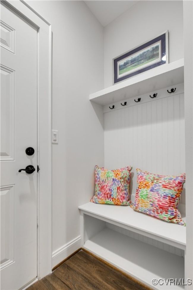 Mudroom featuring baseboards and dark wood-type flooring | Image 44
