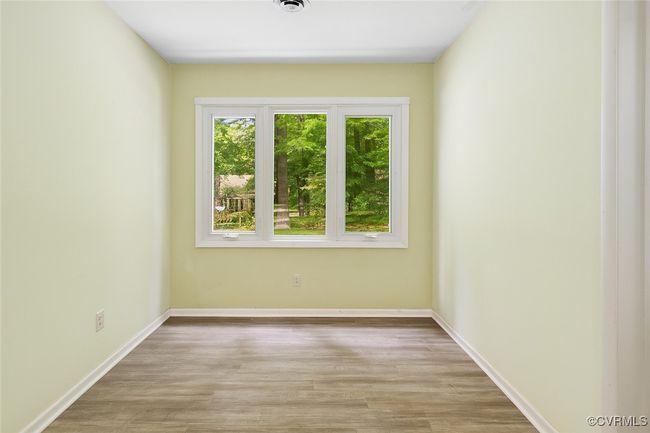 Unfurnished room with light wood-style floors | Image 8