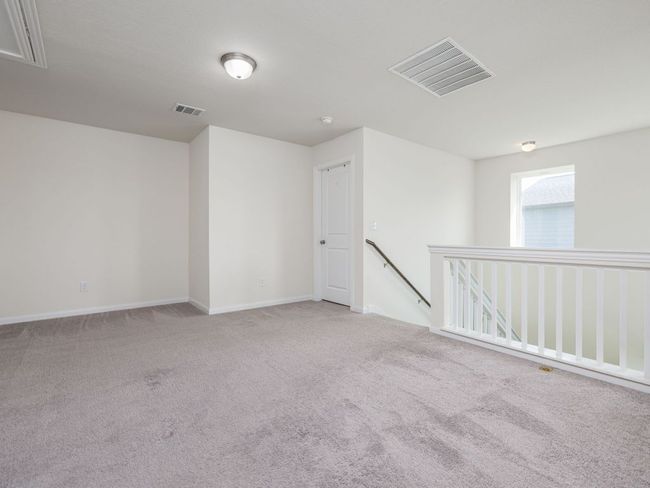 Loft or gameroom which can be used as a secondary living area | Image 15