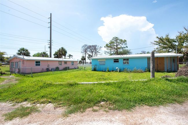 1999 Placida Rd, Home with 5 bedrooms, 3 bathrooms and null parking in Englewood FL | Image 12