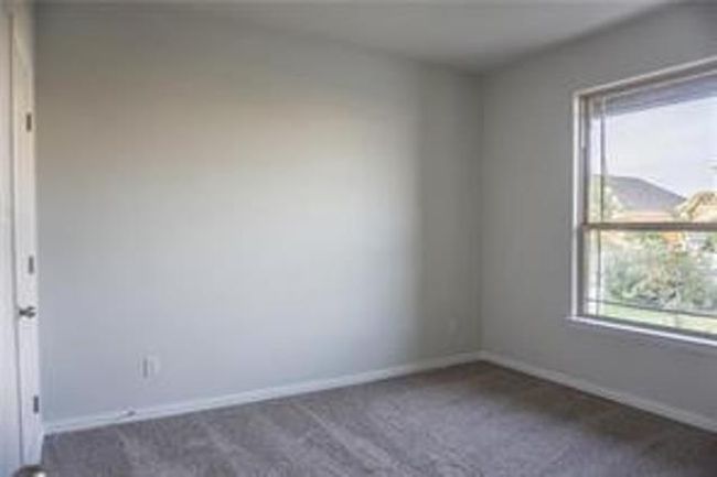 Unfurnished room featuring carpet flooring and baseboards | Image 13