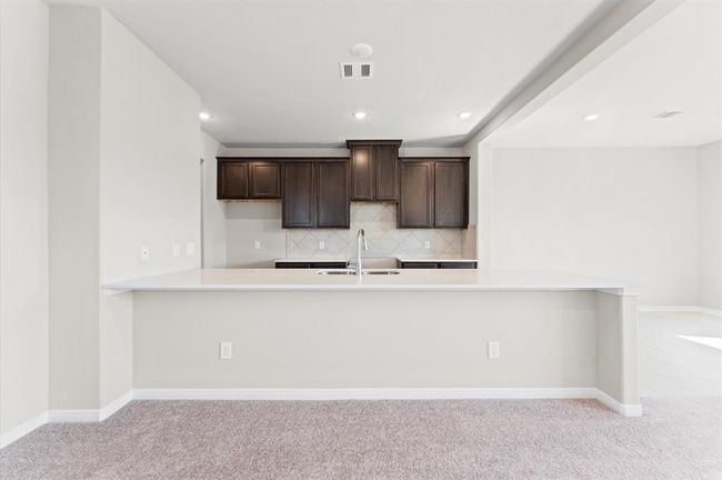 Breakfast bar has room for the family. | Image 9