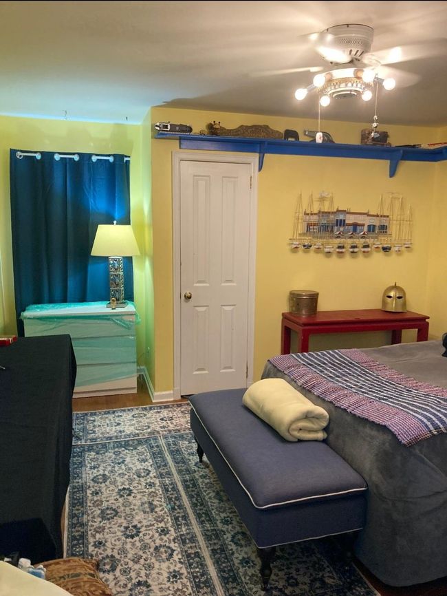 Bedroom featuring wood finished floors | Image 40